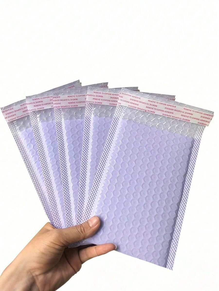 buste colorate a bolle di diverse dimensioni, buste protettive per prodotti aziendali, buste per la spedizione, forniture per la spedizione