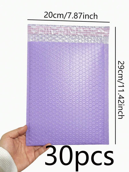 buste colorate a bolle di diverse dimensioni, buste protettive per prodotti aziendali, buste per la spedizione, forniture per la spedizione