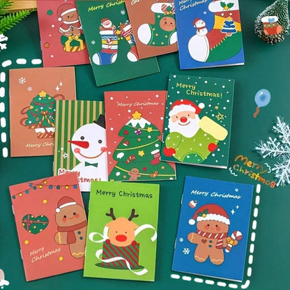 Blocchetti per appunti natalizi mini - Disegni di Babbo Natale e pupazzo di neve, tascabili, con diversi motivi natalizi