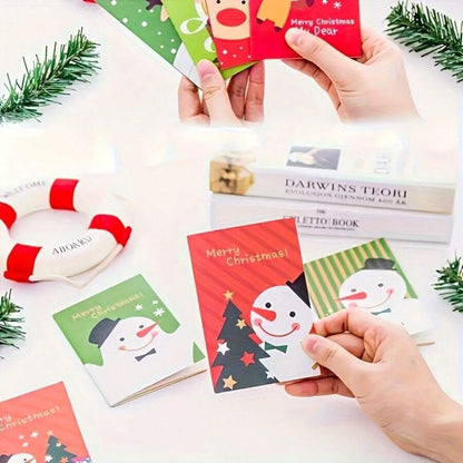 Blocchetti per appunti natalizi mini - Disegni di Babbo Natale e pupazzo di neve, tascabili, con diversi motivi natalizi