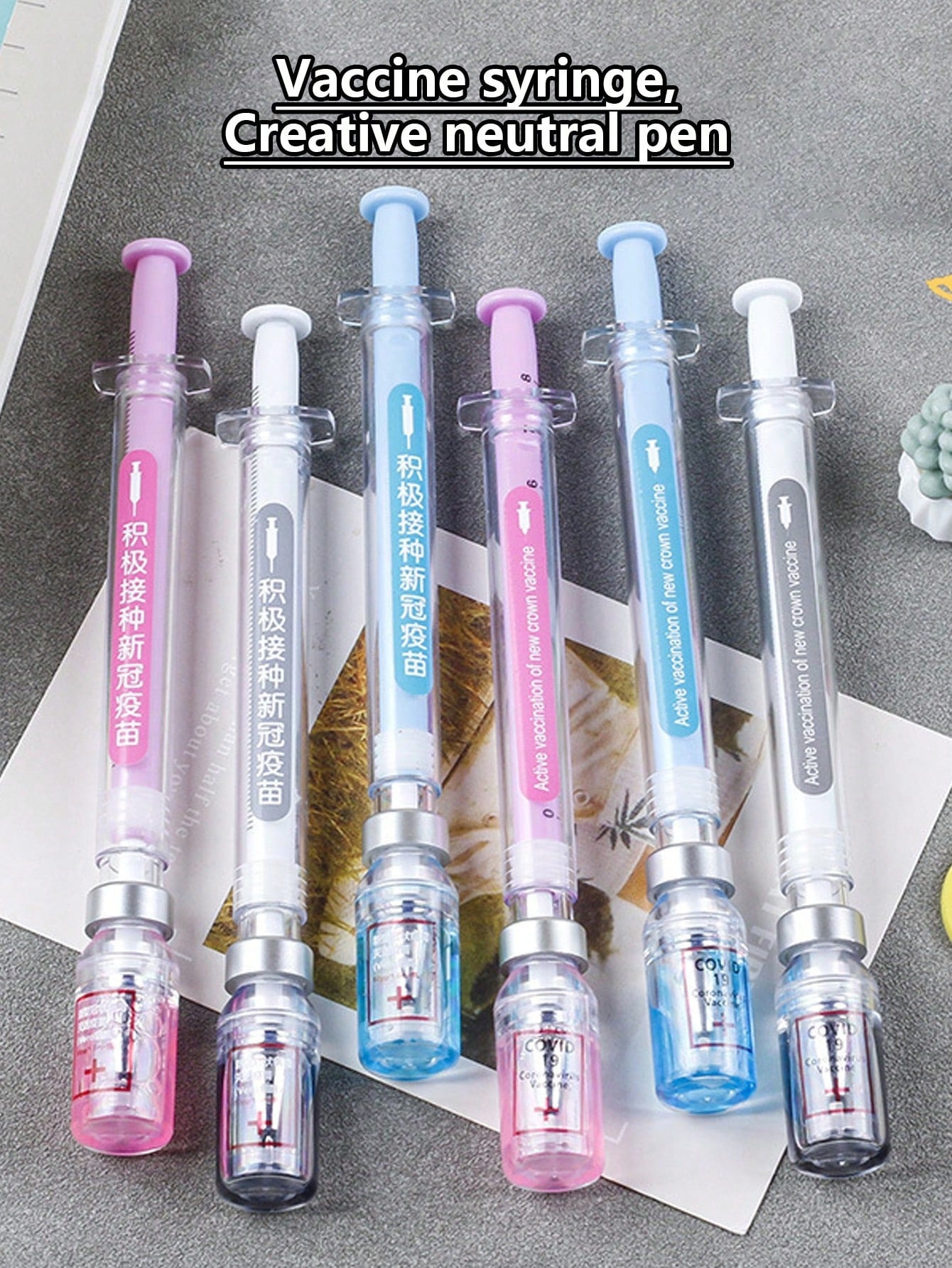 Siringa con penna neutra per simulare l'eliminazione del virus, design di siringa con penna nera e penna per vaccino distribuiti casualmente