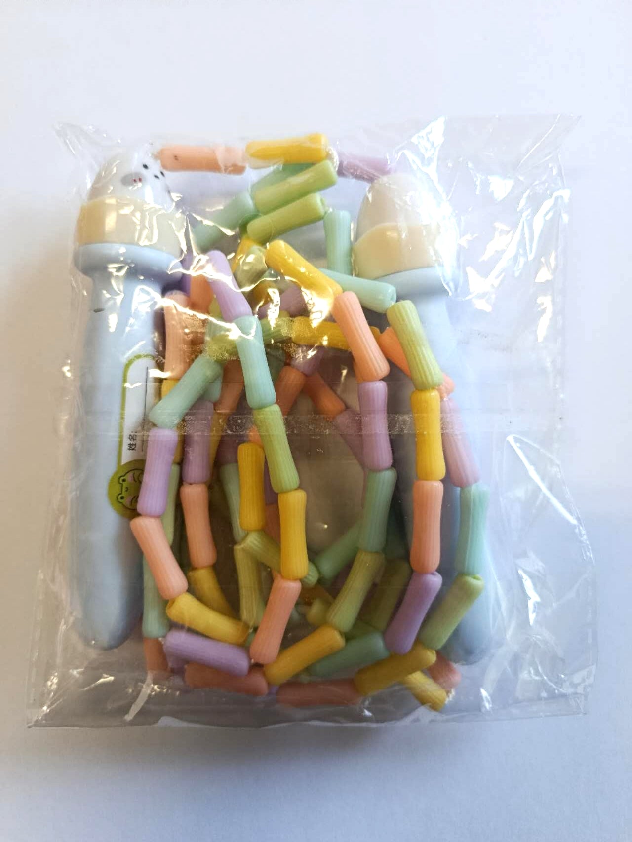 Corda da salto per bambini color pastello stile con personaggio simpatico