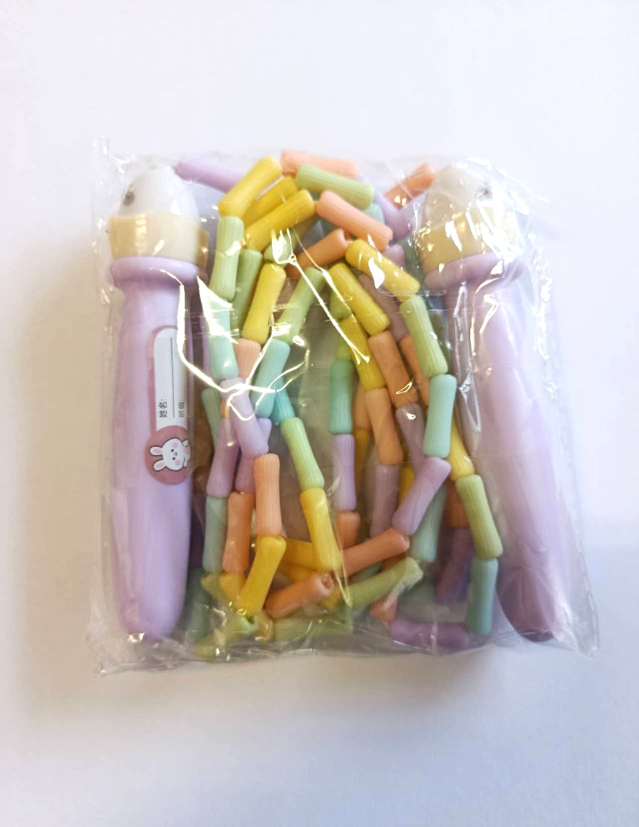 Corda da salto per bambini color pastello stile con personaggio simpatico