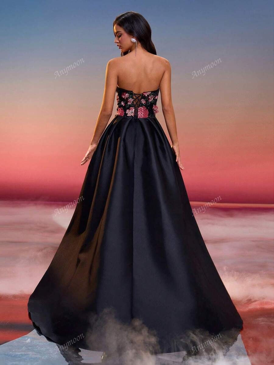 Vestito da sera elegante lungo con fiori ricamati e nodo sulla parte anteriore